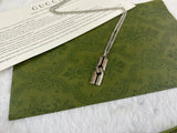 GG Knot Pendant Necklace