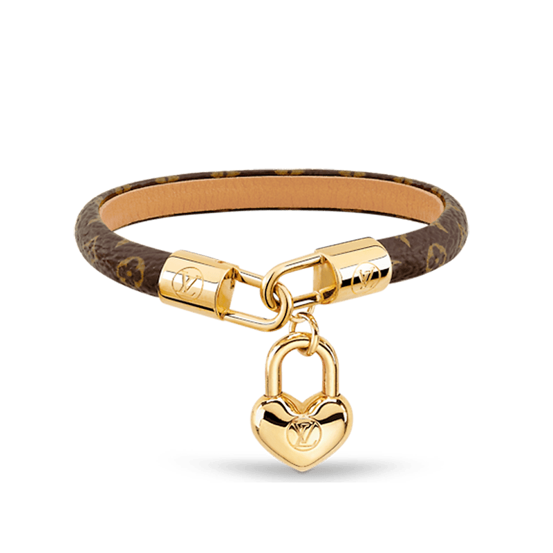 Bracelet with heart-shaped gold lock charm on a transparent background