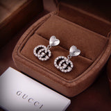 18K GG Running Earrings