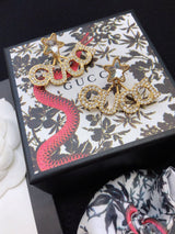 18K GG Script Star Earrings