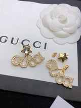 18K GG Script Star Earrings