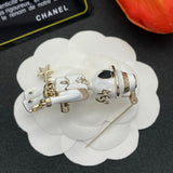 18K CC Robot Gabrielle Doll White Brooch