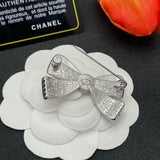 18K CC Bow Tie Gold Brooch