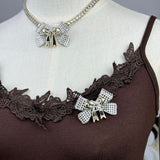 18K CC 25K Bow Tie Diamond Brooch